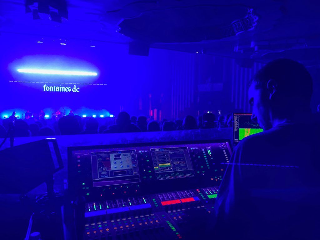 FOH engineer, Chris Butterworth mixes the sound for the concert sound system