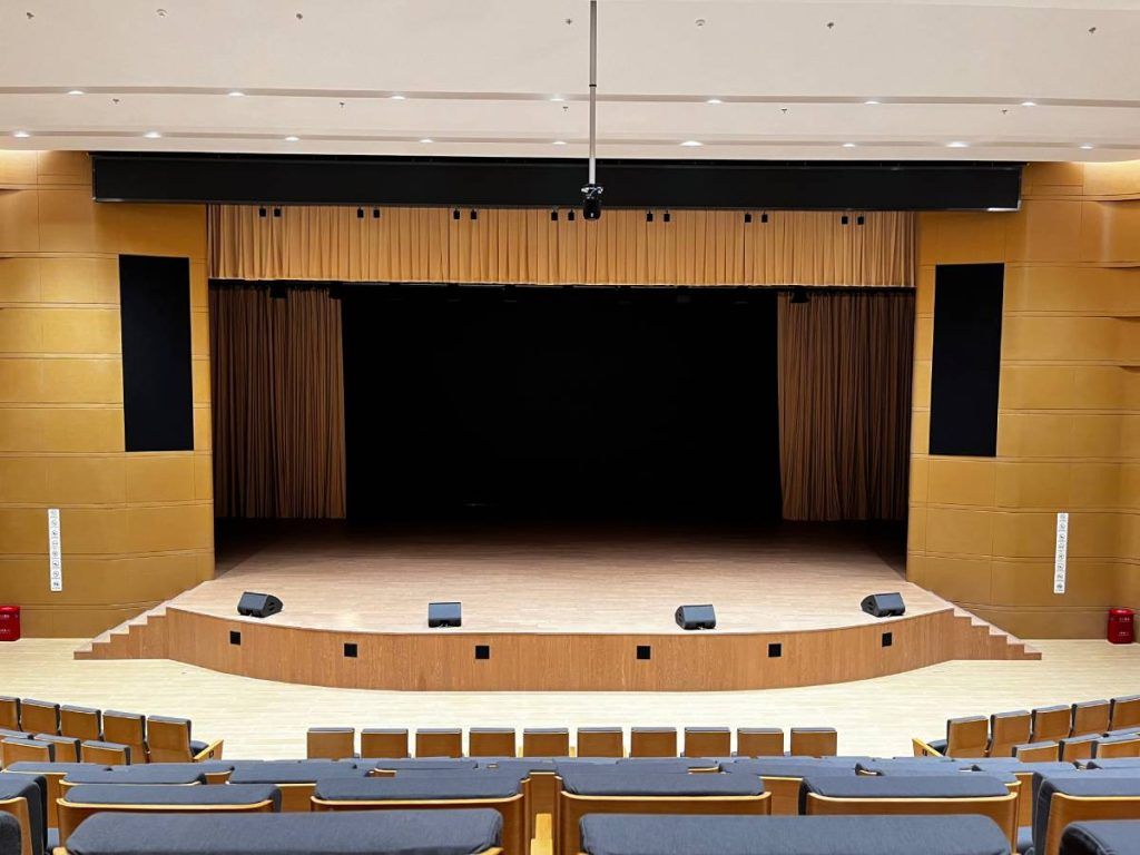 The Beijing City Library's multi-purpose Zhihe Hall boasts three L-Acoustics A10i Focus and two L-Acoustics KS21i subwoofers per side, hidden behind black mesh screens