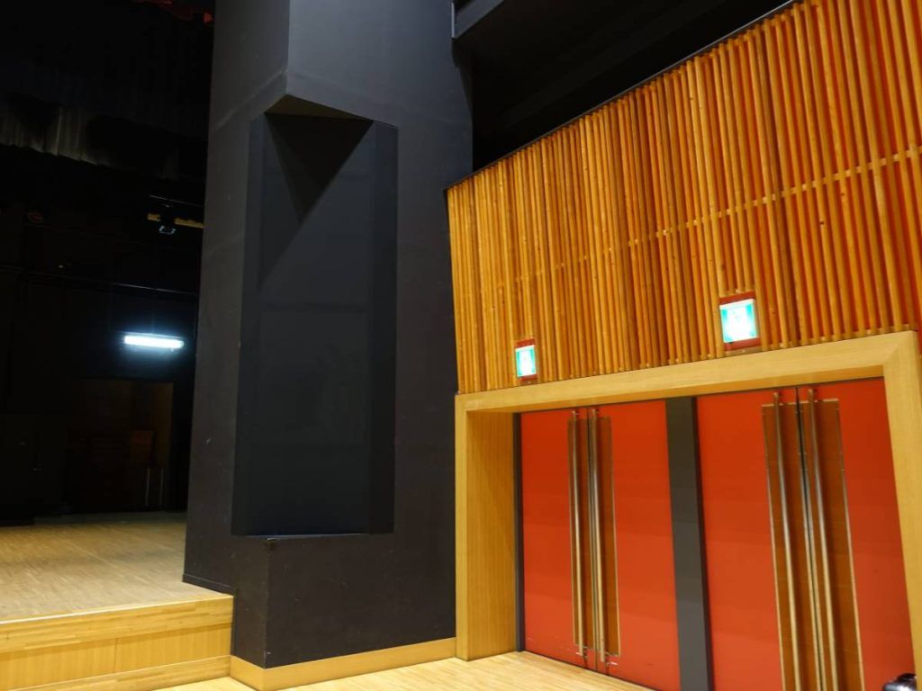 A main L/R system of five L-Acoustics Kiva II speakers atop two SB15m subwoofers Concert Sound System per side is housed behind acoustically transparent mesh screens