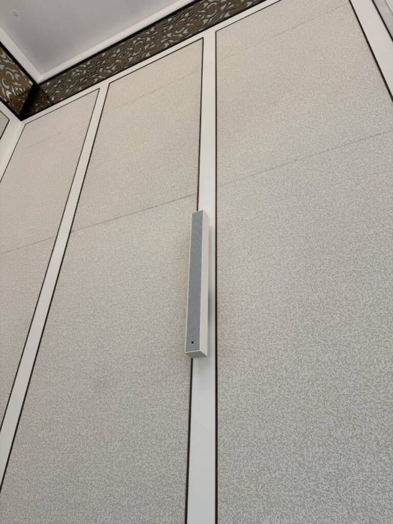 L-Acoustics Soka in a white finish seamlessly integrates with the John Jacob Ballroom's interior at The St. Regis Singapore