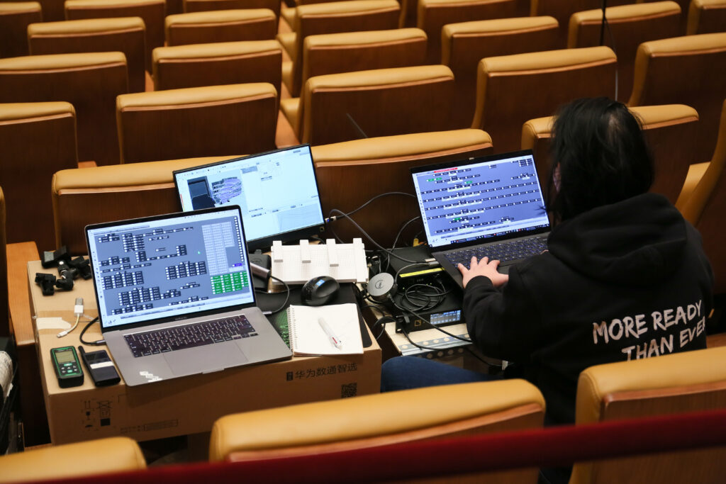 The venue’s L-ISA spatial systems support a programming schedule that covers opera, chamber music, and contemporary performance